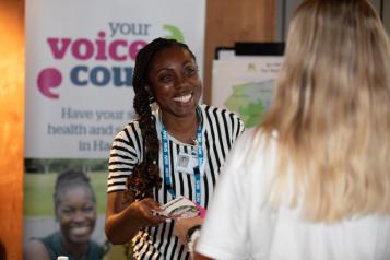 Healthwatch staff member speaking with a member of the public